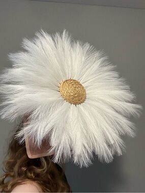 Giant faux pampas daisy woven center detail and green leaf accents fascinator